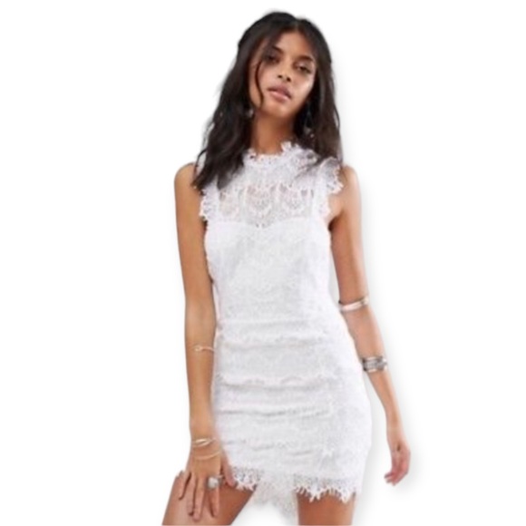 Free People Dresses & Skirts - Free people opened back white lace mini dress size Medium NWT